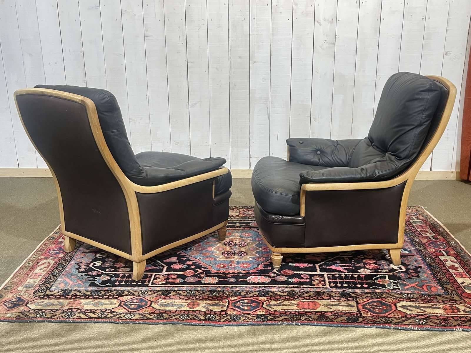 Pair of leather and beech armchairs from the 1970s.