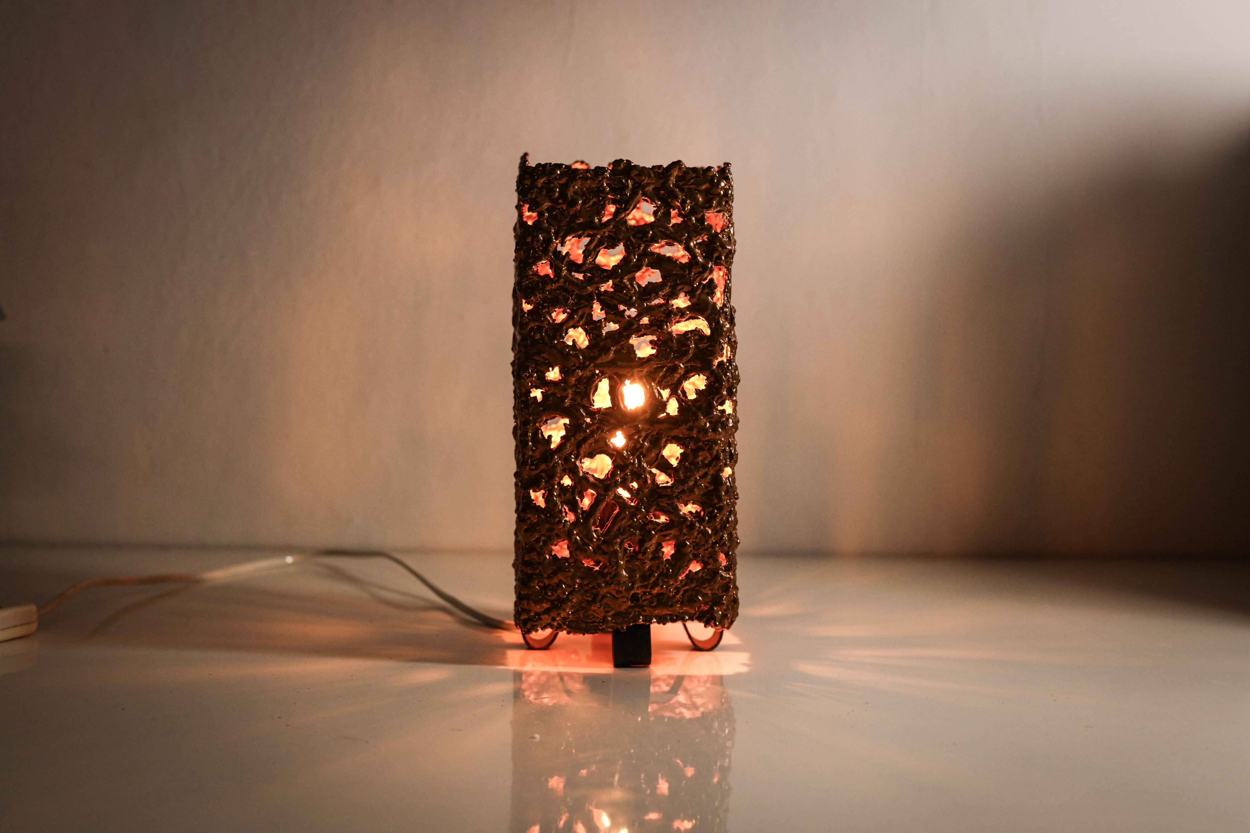 Set of 3 Finnish Aimo Tukiainen lamps in cast copper, 1960s."