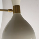 Articulated wall light in the style of Italian creations from the 1950s.