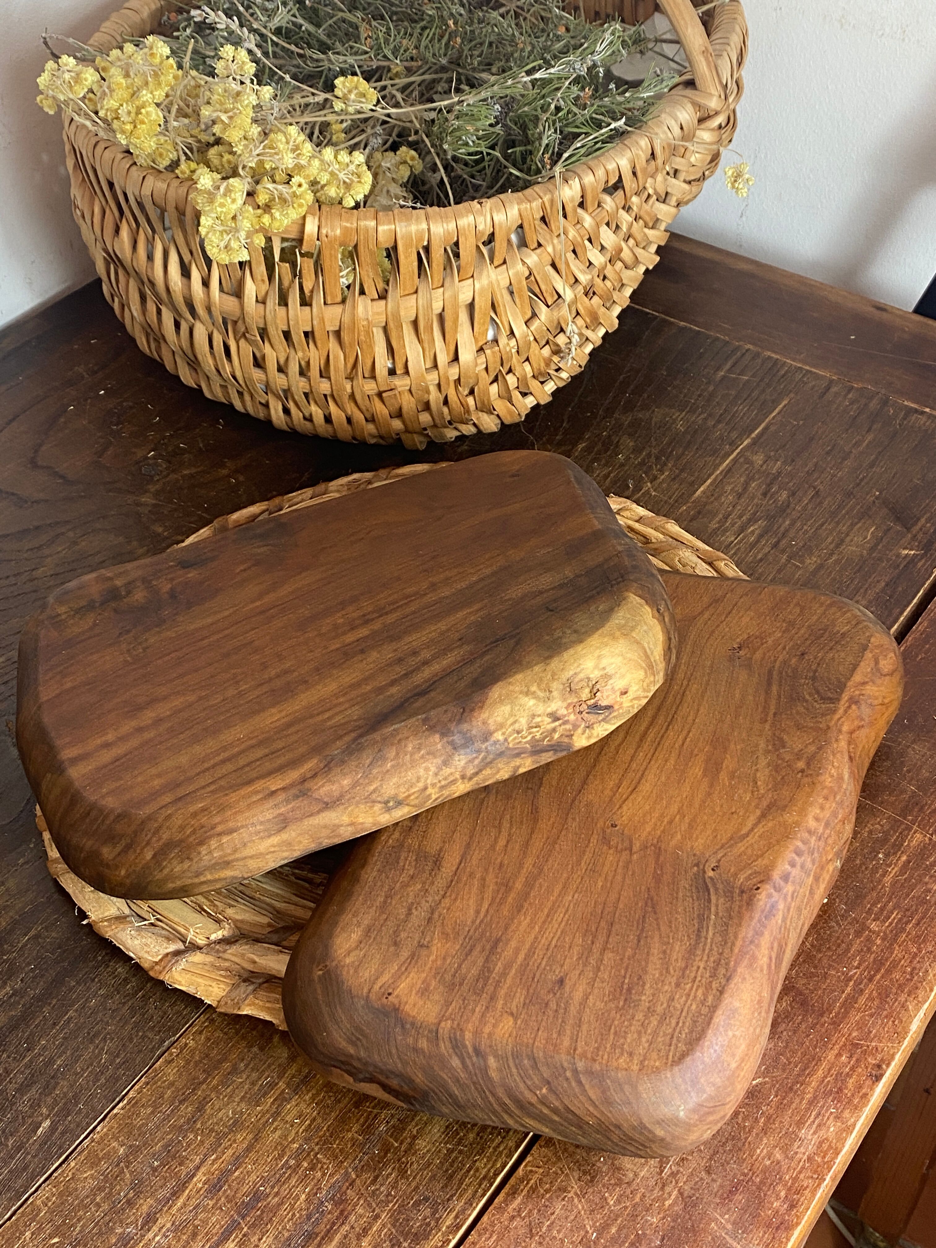 Olive wood platters, in organic shapes.
