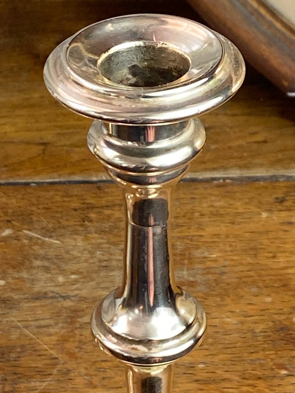 Pair of brass and stone candlesticks