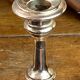 Pair of brass and stone candlesticks