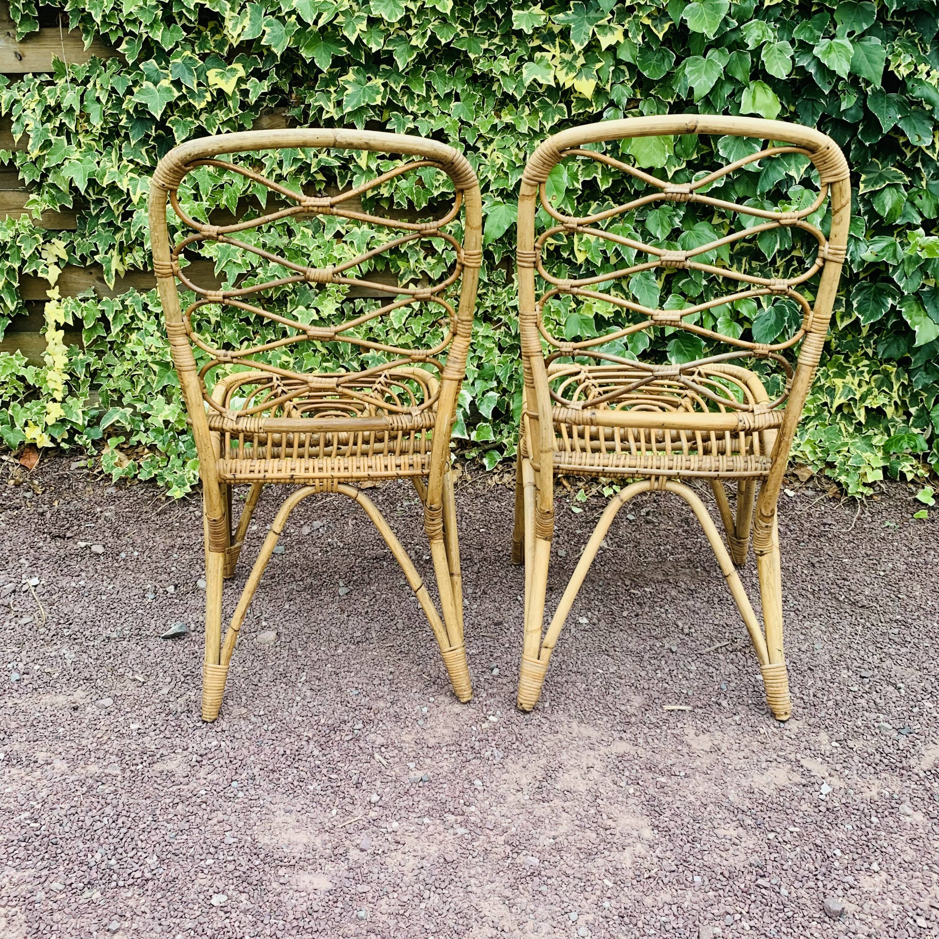 Paire de chaises en rotin Van Rohe