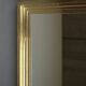 Grand miroir en laiton dans le style de Maison Jansen, années 1960.