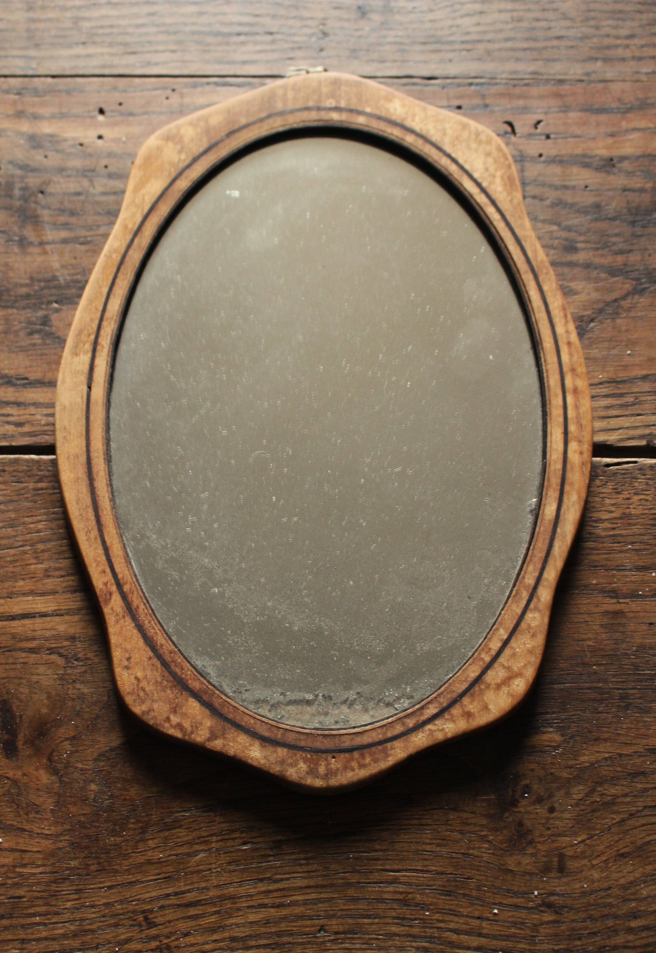 Small old wooden mirror