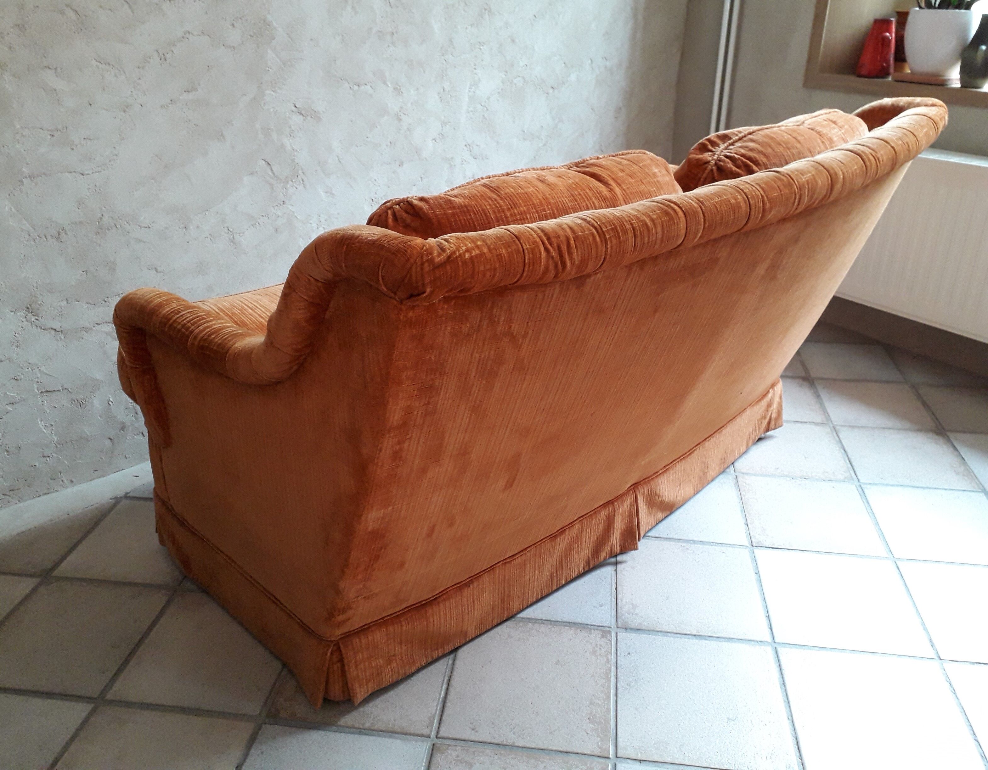 Orange velvet two-seat sofa