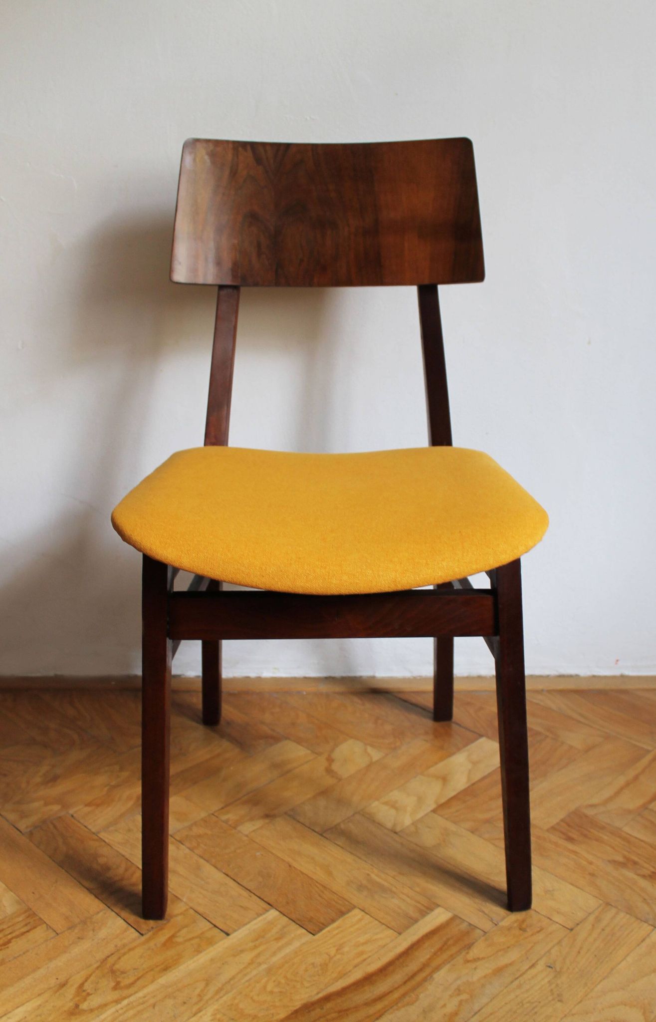 Vintage dining chair from the 1960s, Scandinavian style, wood and fabric.