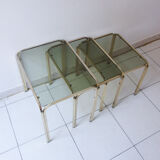 Series of nesting tables in smoked glass & rectangular golden brass