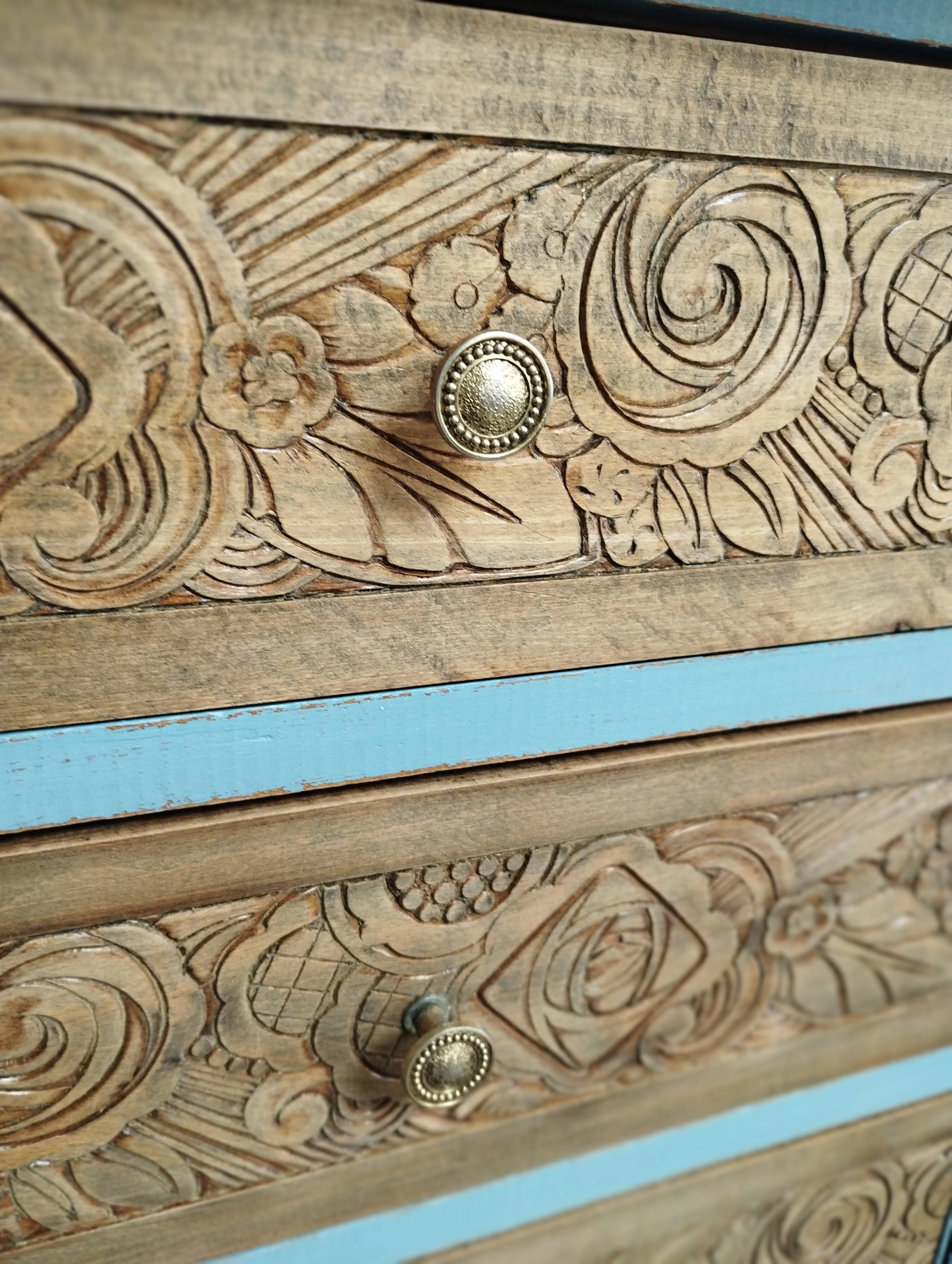 Small carved wood chest of drawers