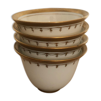 4 white porcelain cups with golden pattern