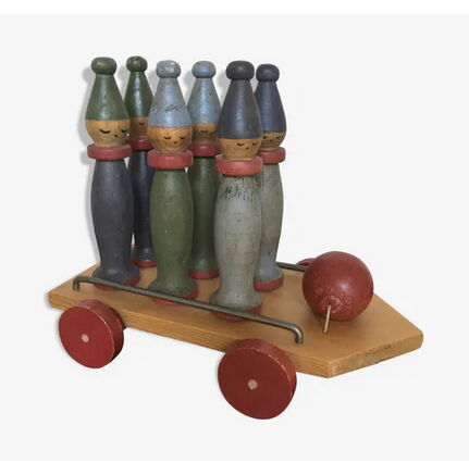 Set of Moulin Roty brand wooden bowling on roller cart, limited series.