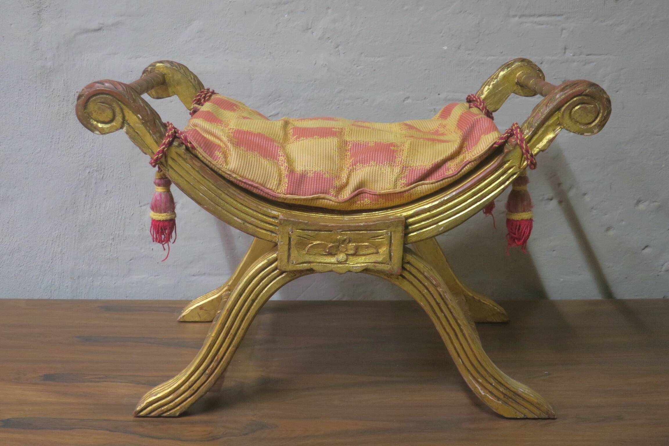 Antique parcel gilt cruciform stool