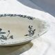 Iron flat plate with a 19th-century bird signed Onnaing "Poppies"