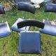 4 Chairs with chrome tubular metal base and black Skaï