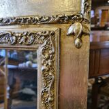 Golden patinated trumeau mirror