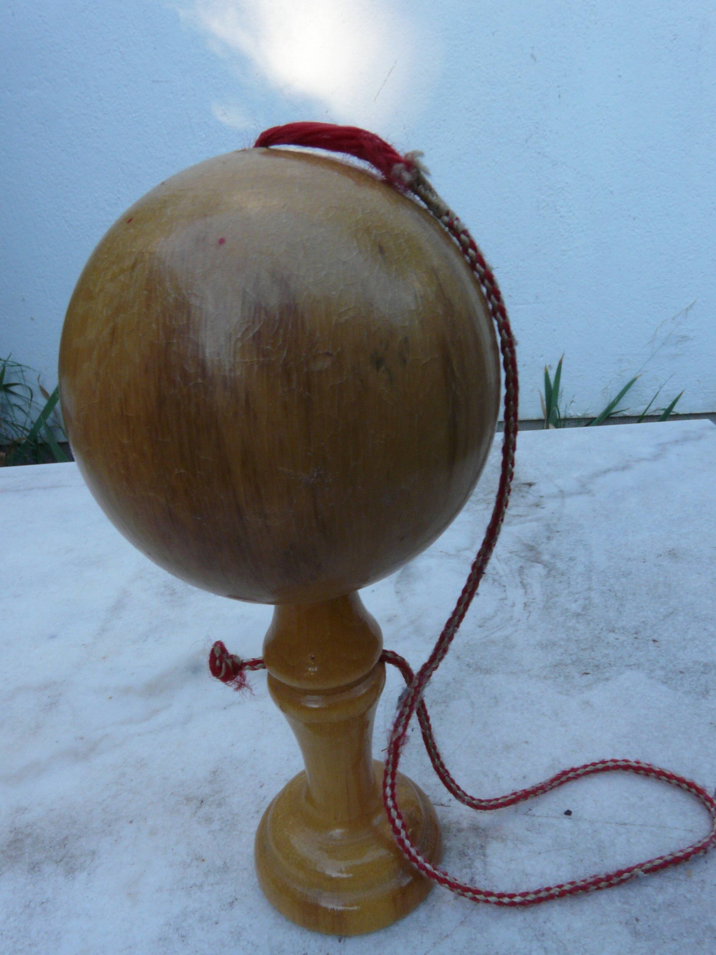 Old wooden bilboquet