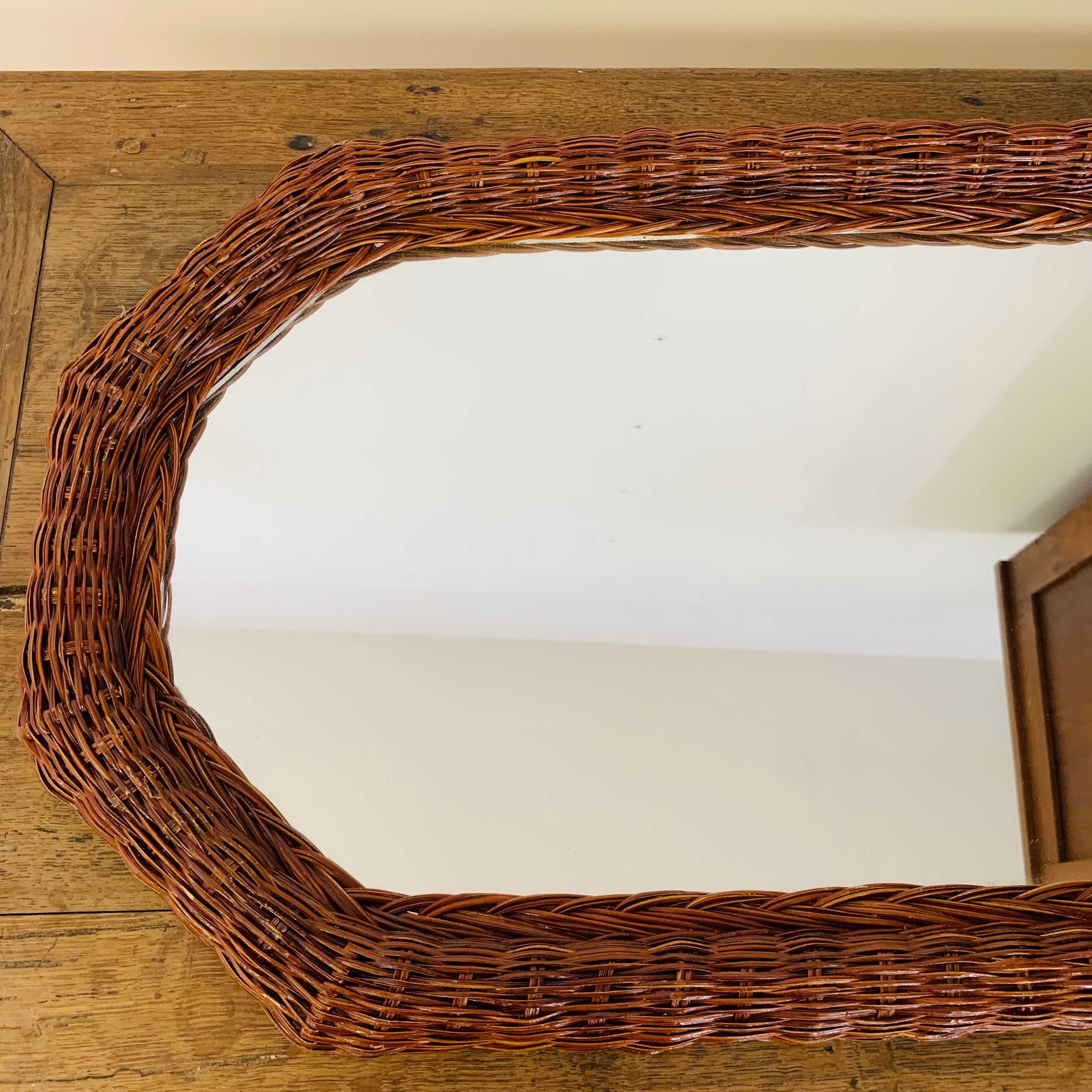 Octagonal wicker mirror