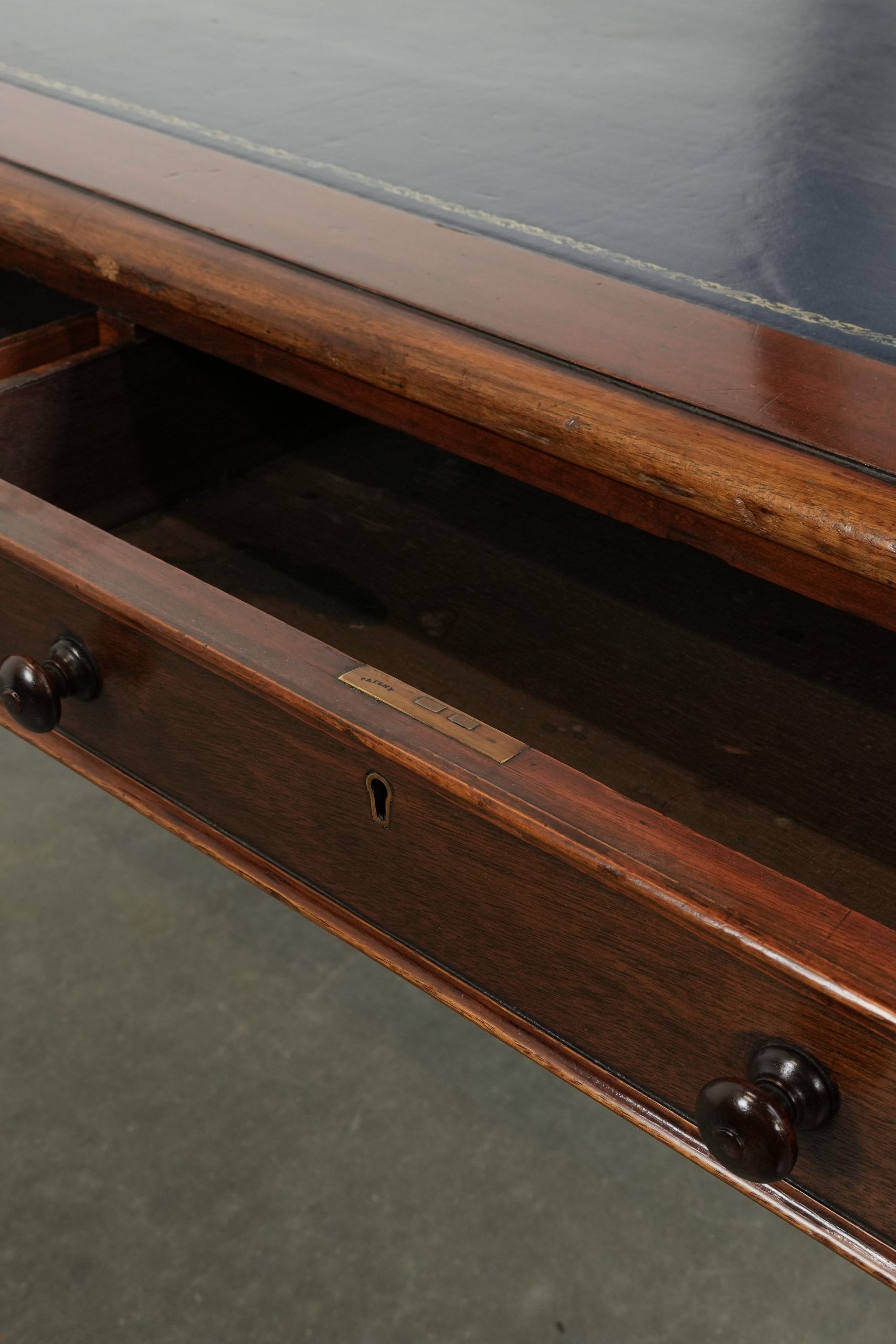 Antique English library table / writing table / desk from the 19th century