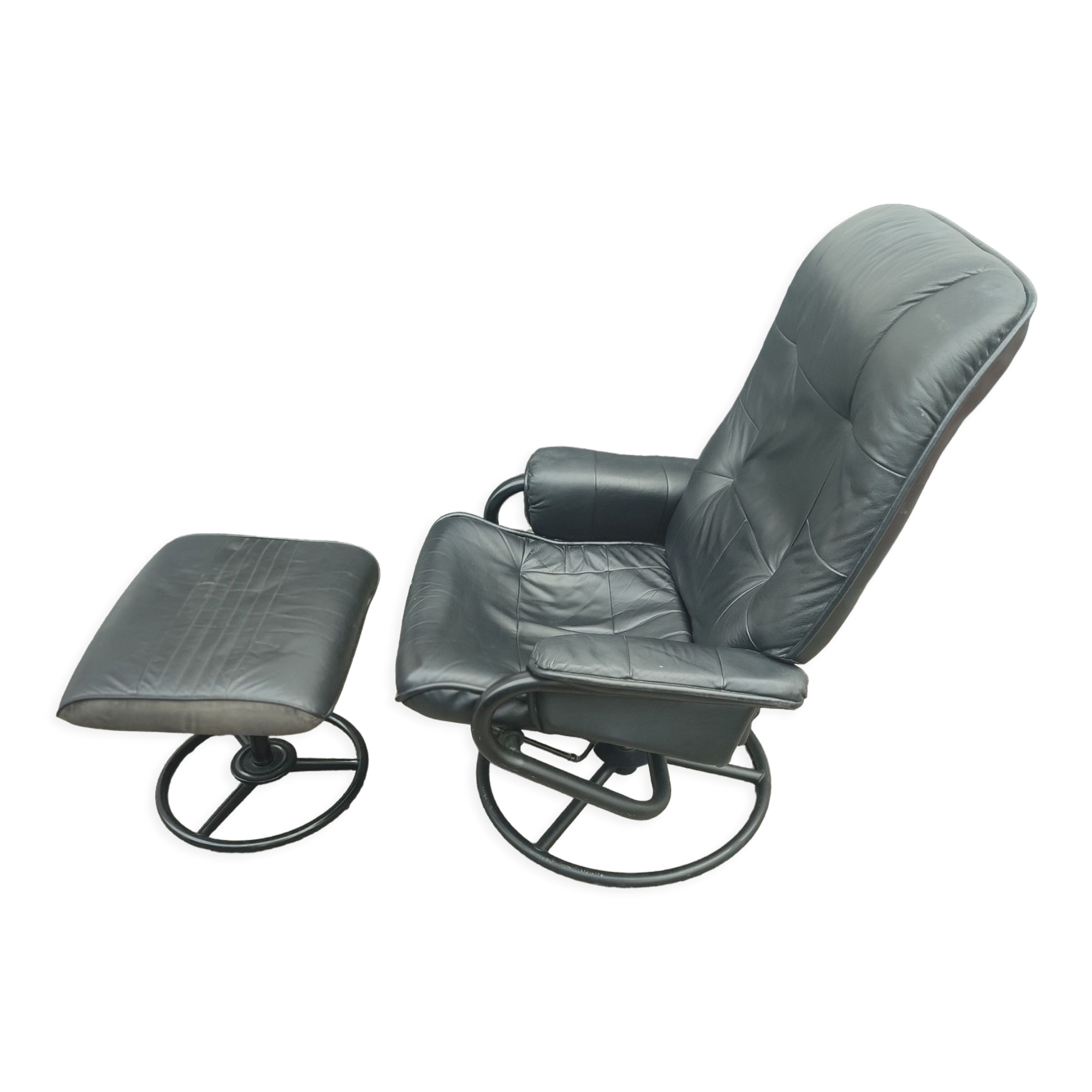 Scandinavian design leather armchair and footrest