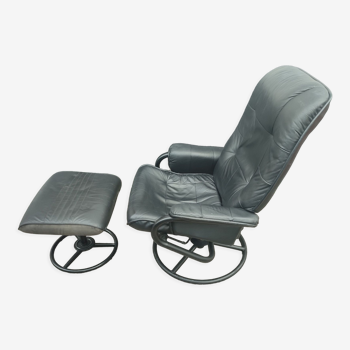 Scandinavian design leather armchair and footrest