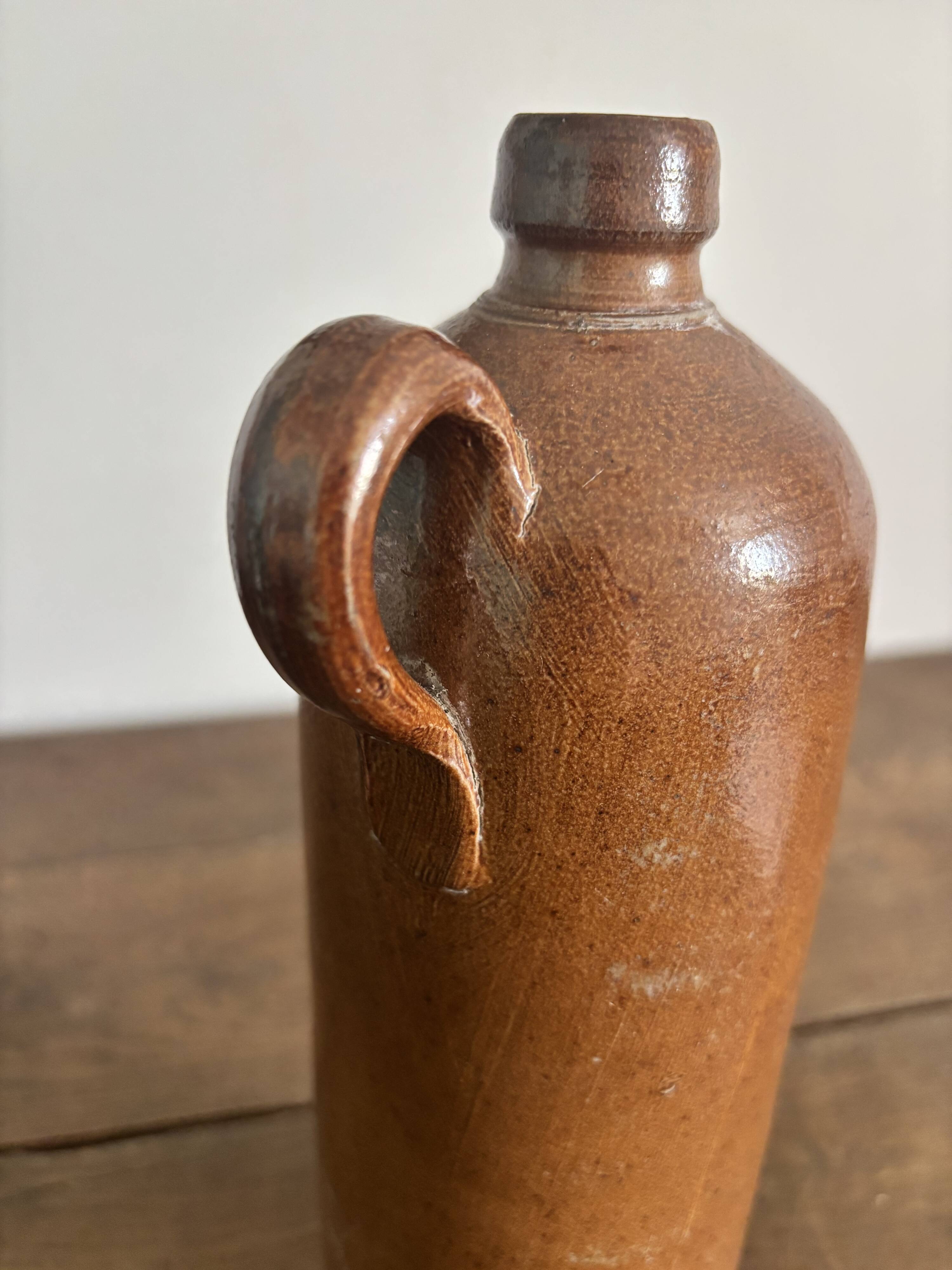 Vintage brown stoneware bottle – Large handled jug