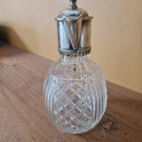 Cut crystal carafe and silver-plated metal