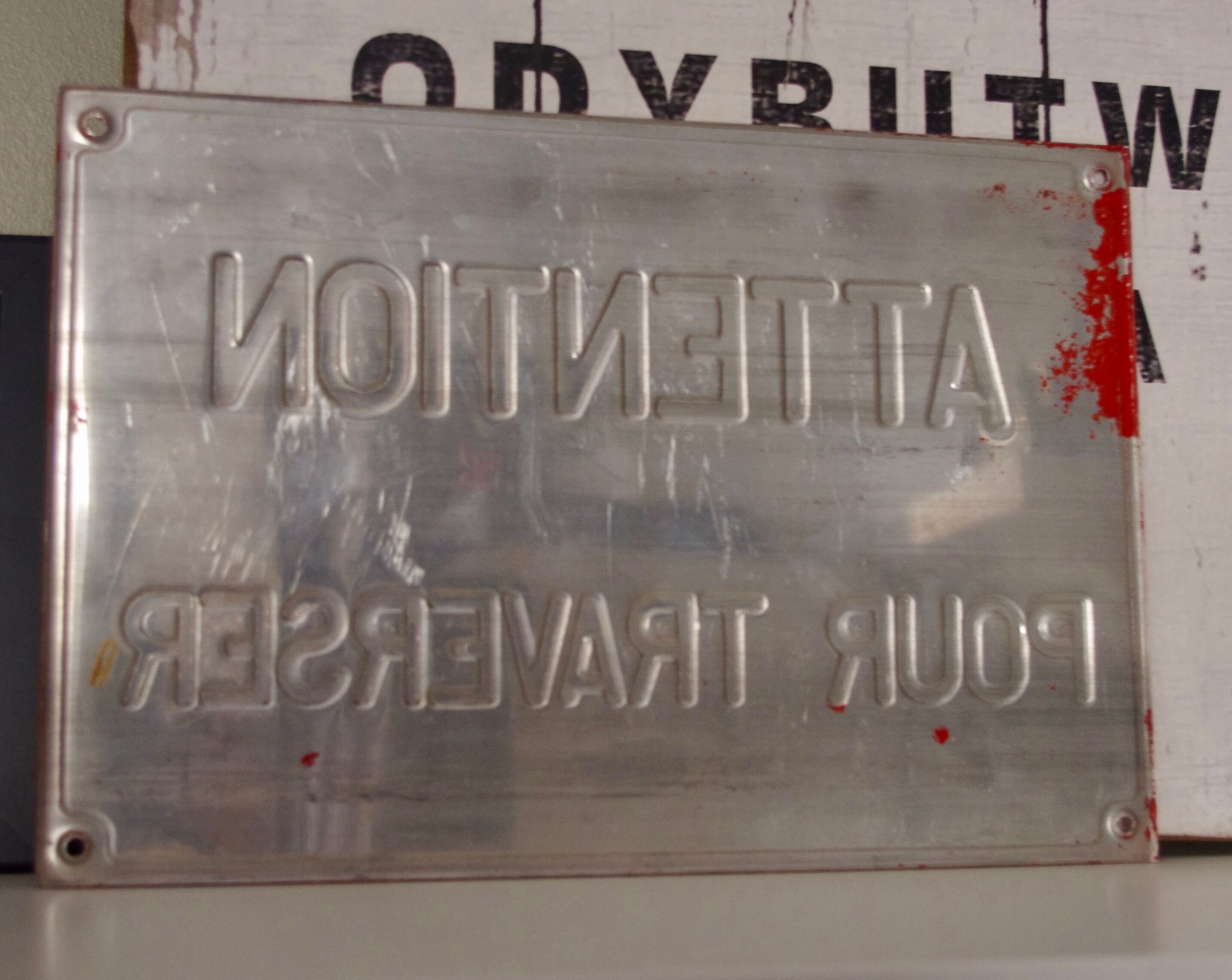 Aluminum plate caution to cross