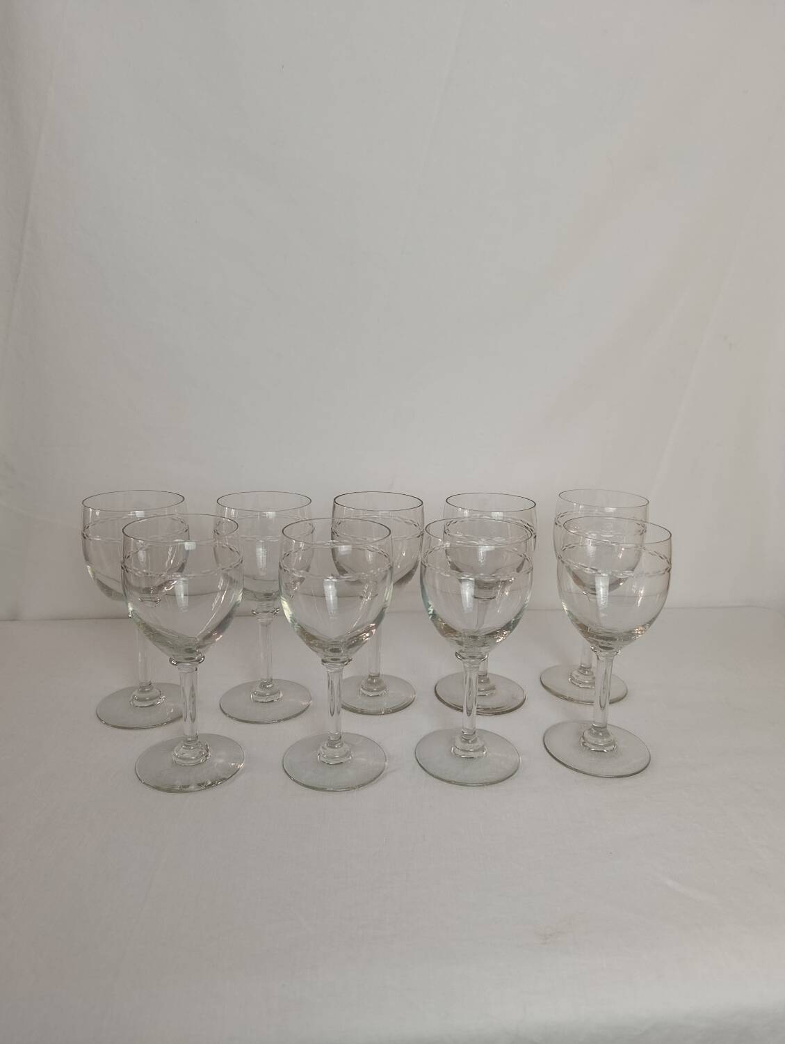 Set of 9 antique engraved crystal wine glasses