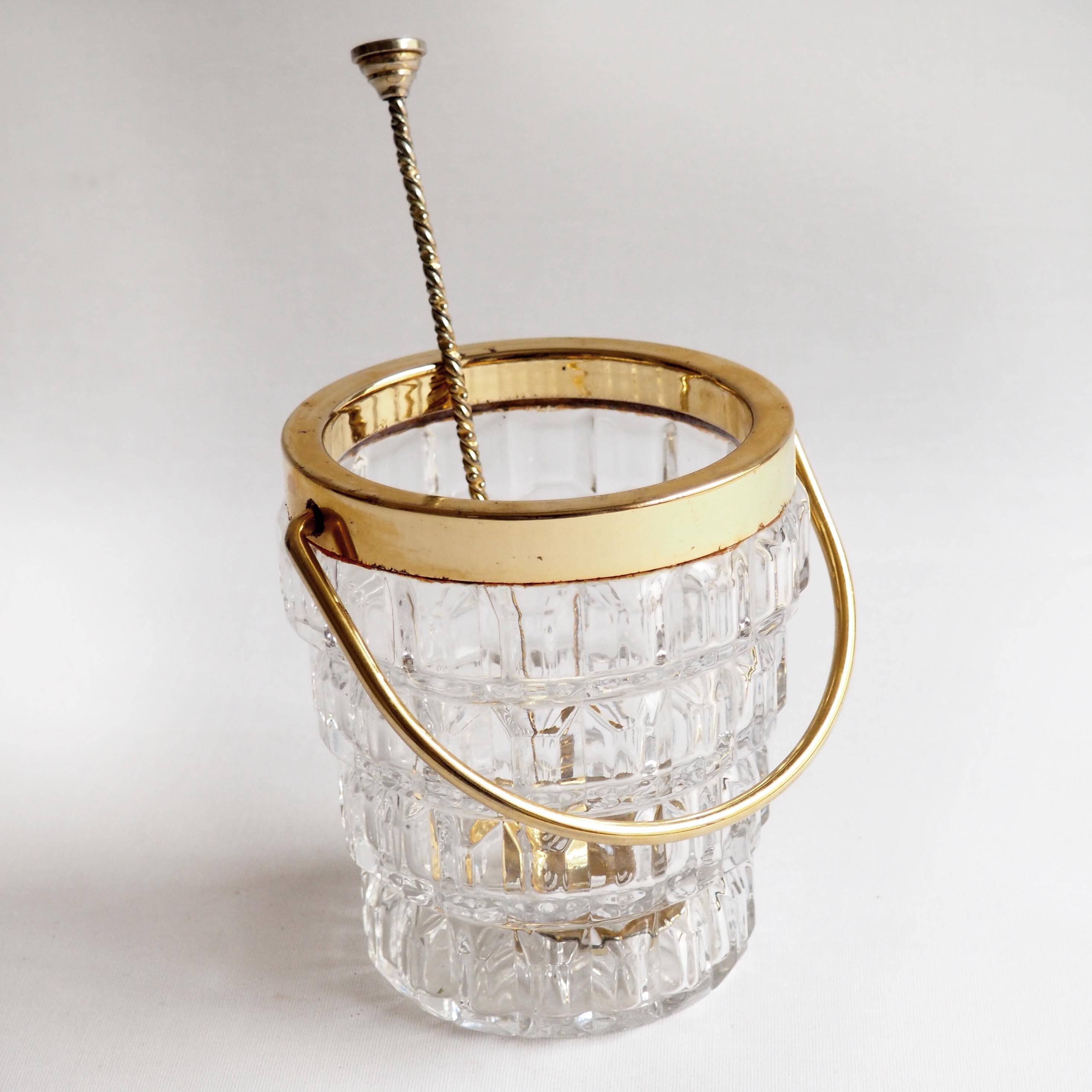 Crystal ice bucket and golden ladle