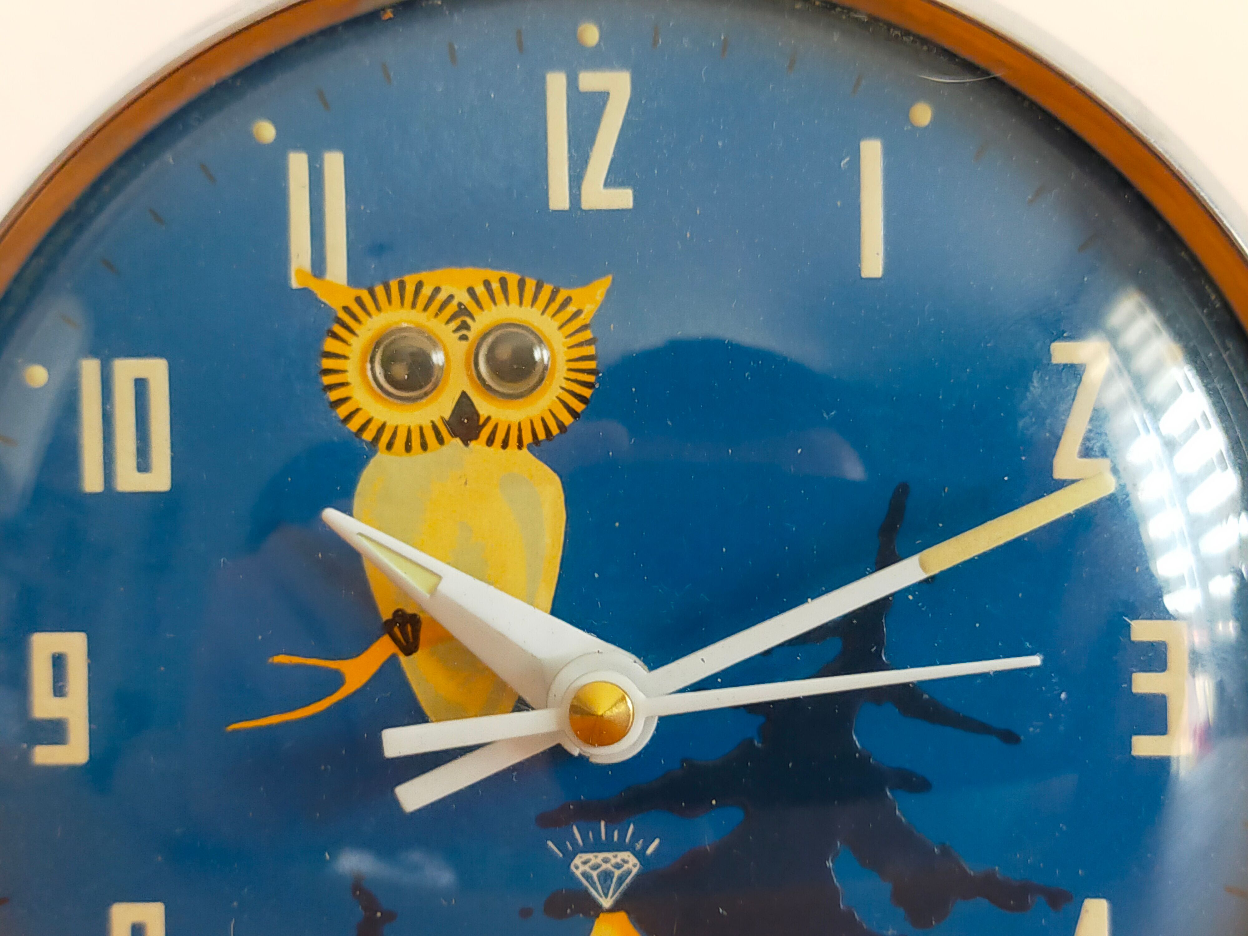 Vintage animated alarm clock in blue owl metal