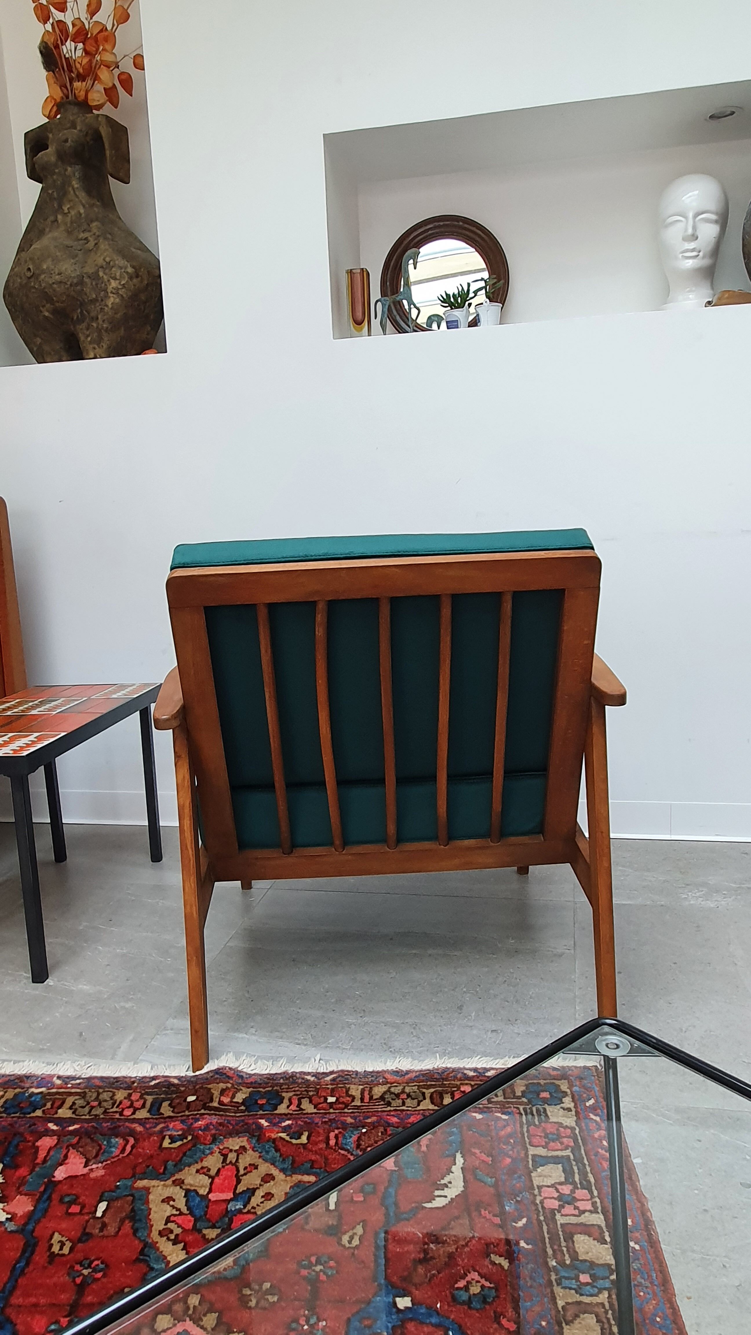 Scandinavian style armchair in forest green velvet