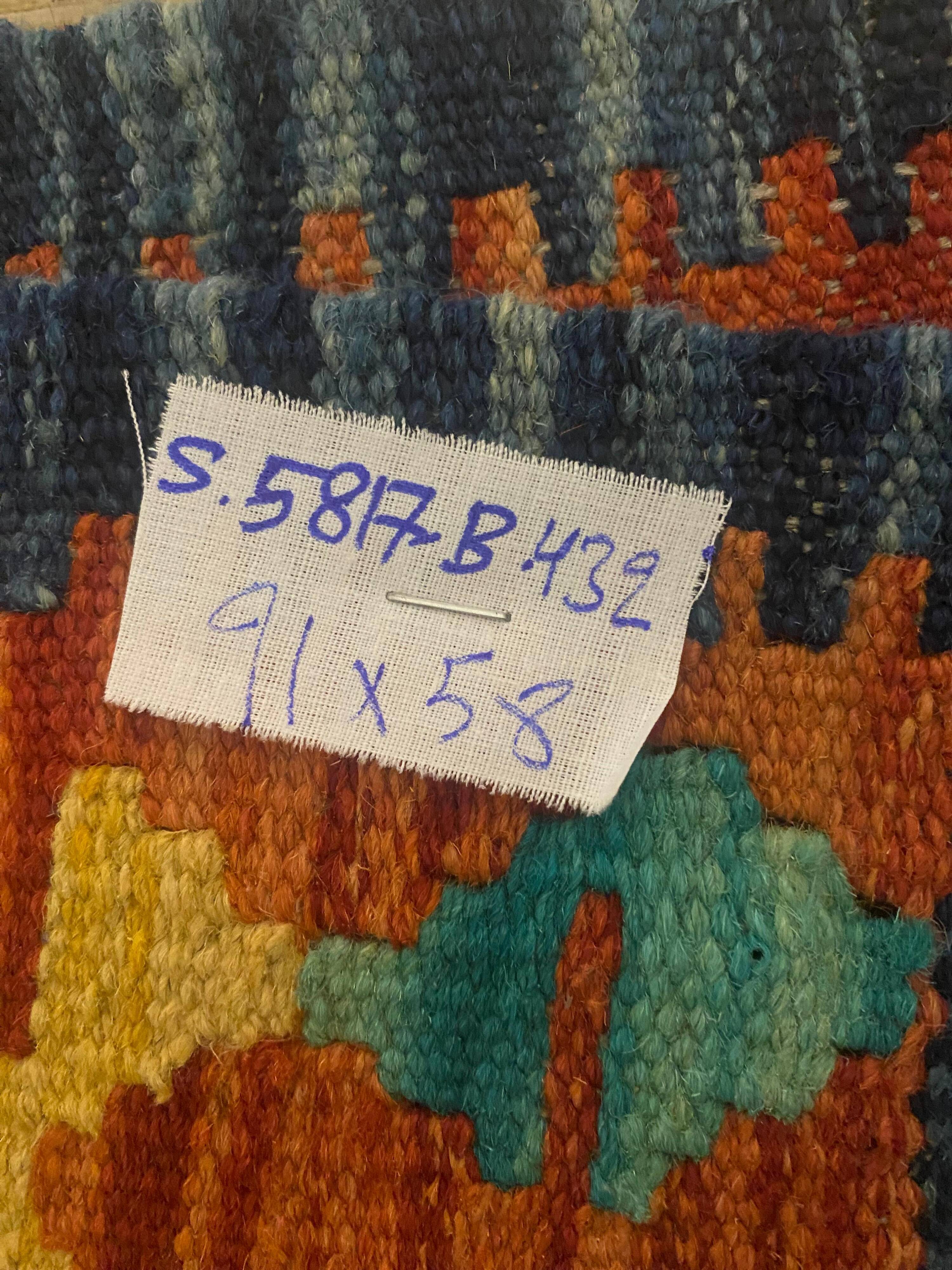 Afghan kilim rug in multicolored wool, geometric patterns