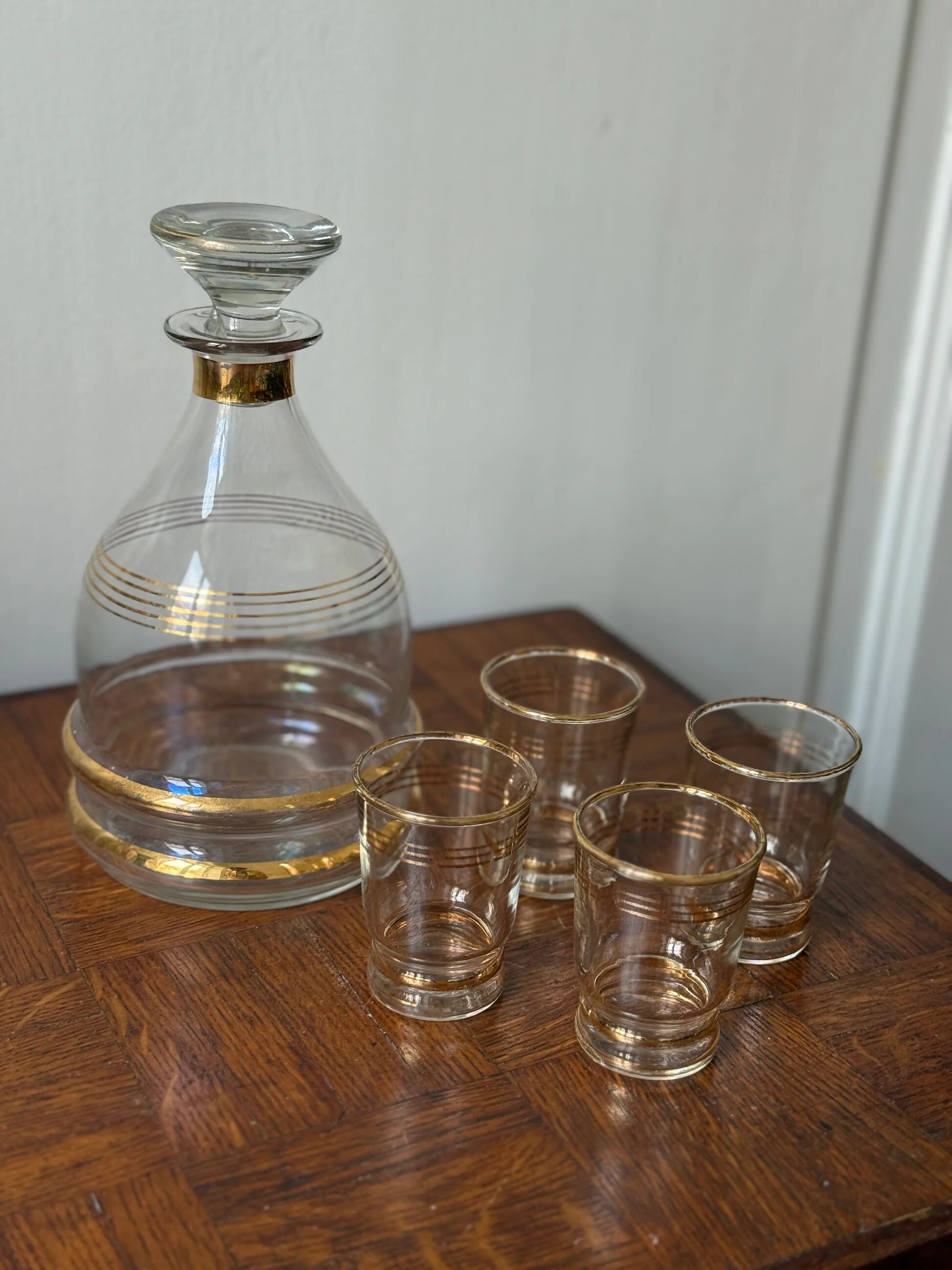 Vintage liqueur service with gold trim