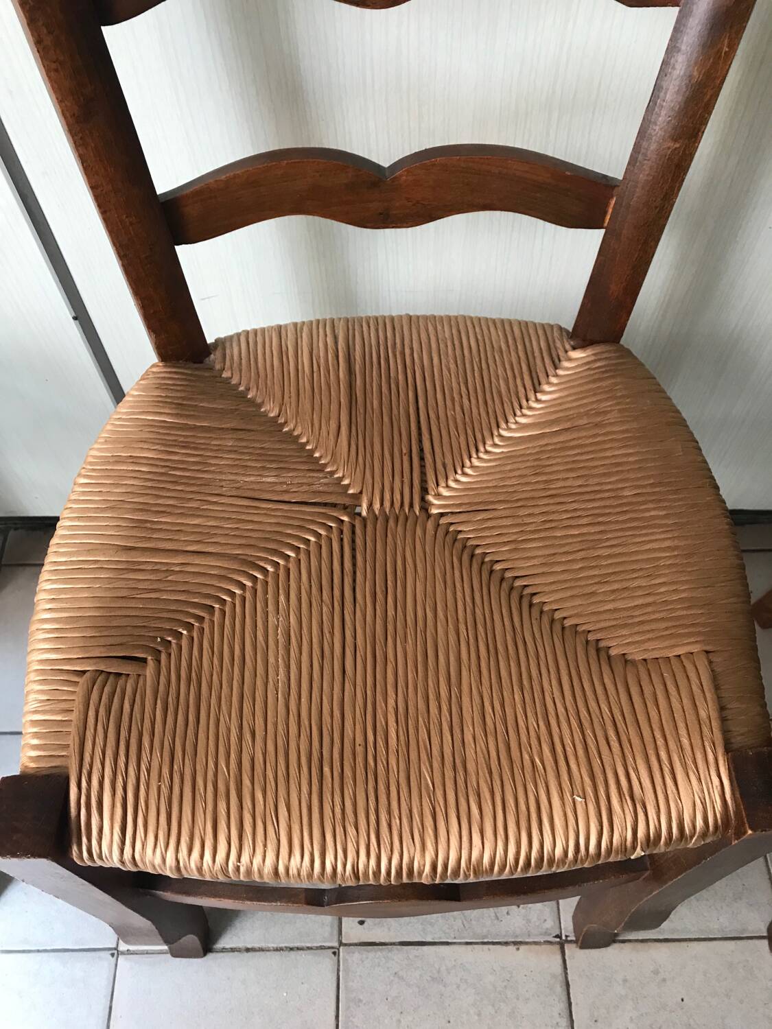 Wooden and straw chairs