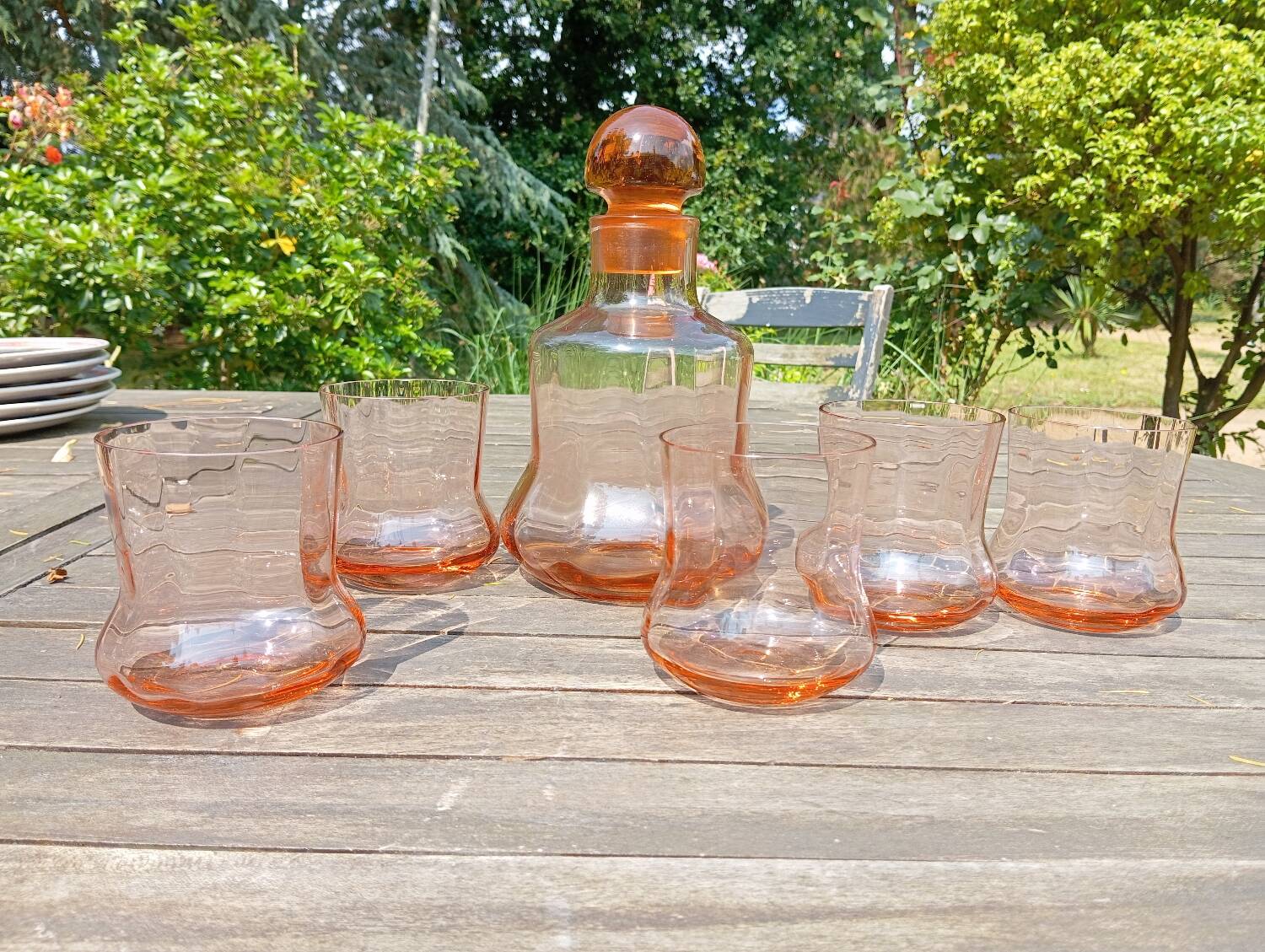Retro whiskey set with pink glass, decanter and 5 glasses