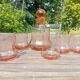 Retro whiskey set with pink glass, decanter and 5 glasses