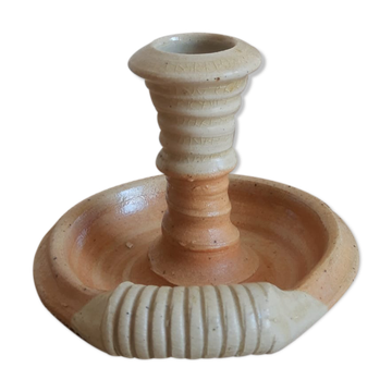 Hand candle holder rat of sandstone cellar