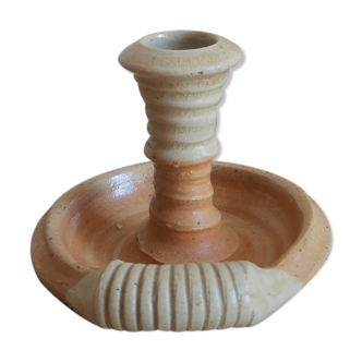 Hand candle holder rat of sandstone cellar