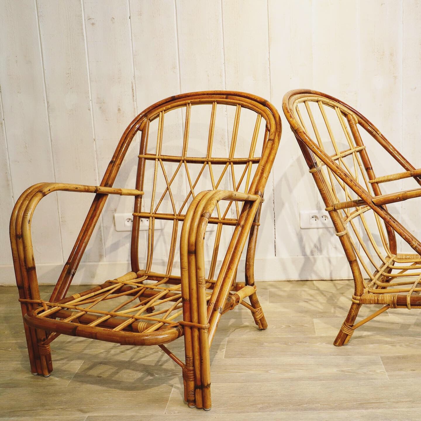 Pair of rattan chairs Audoux & Minnet 1960