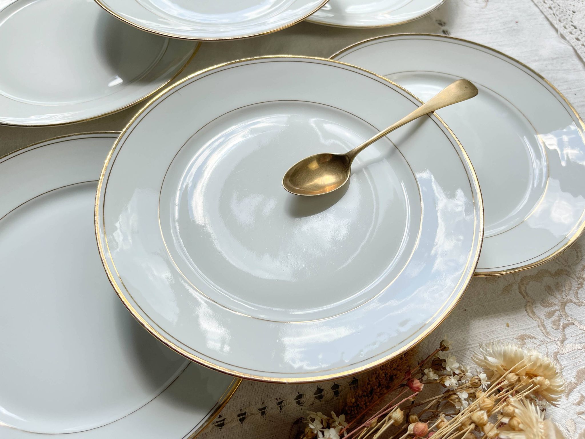 6 Small vintage French plates in golden white Limoges porcelain