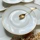 6 Small vintage French plates in golden white Limoges porcelain