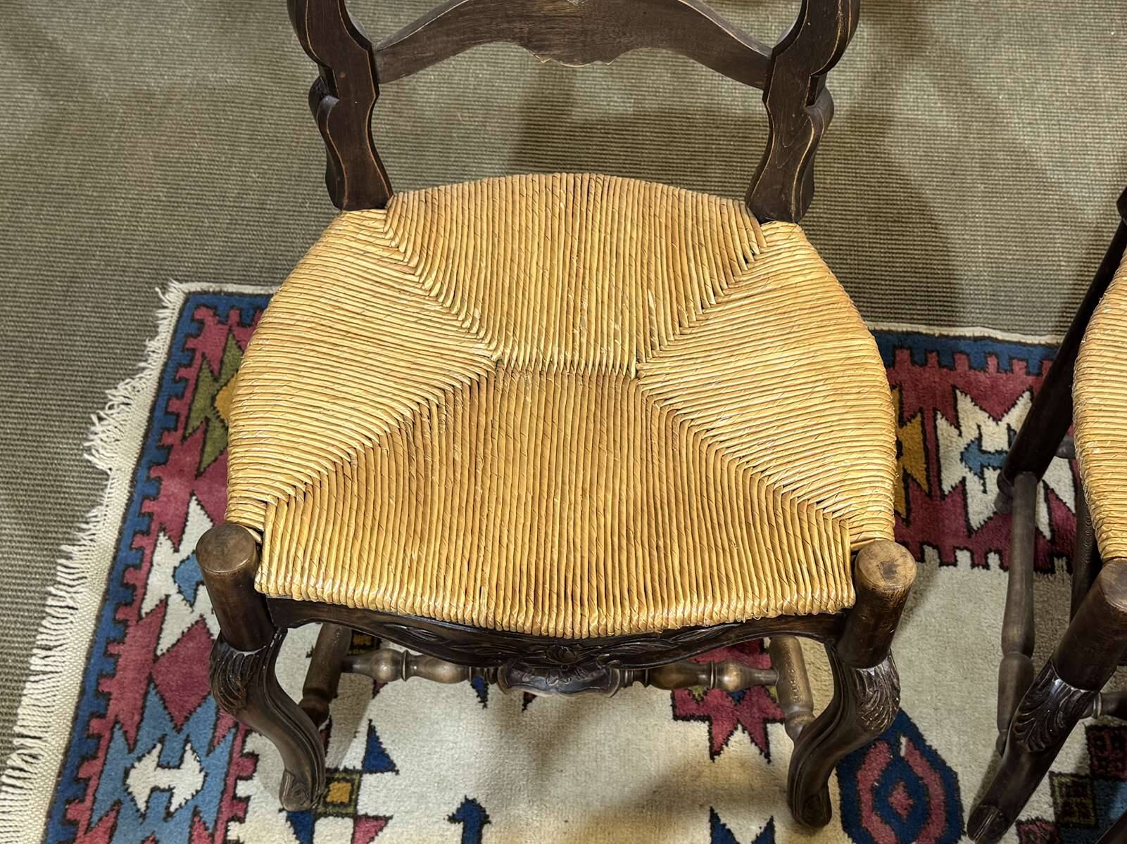 Set of 7 Louis XV style beech chairs with straw seats.