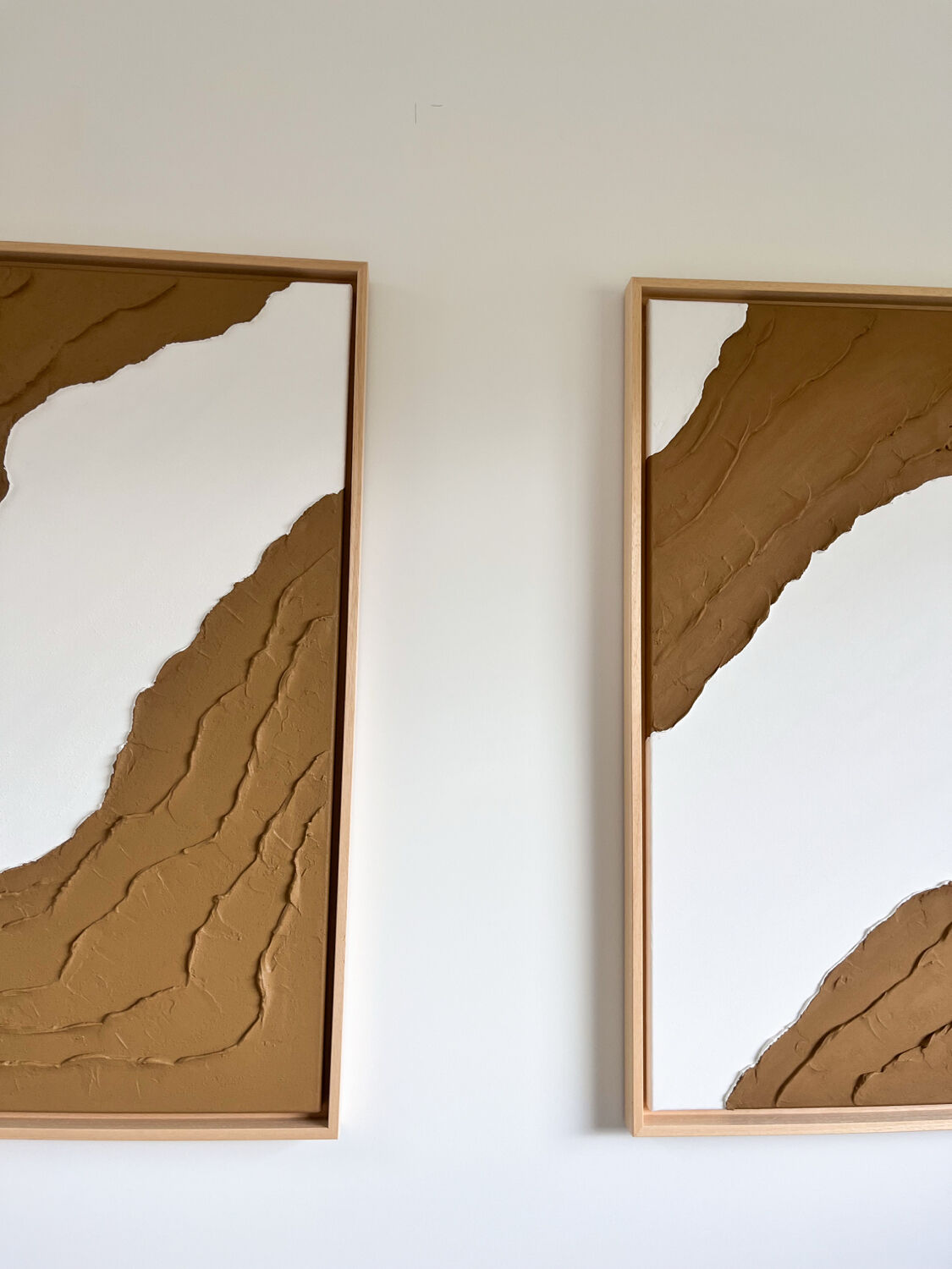 Brown and white relief diptych panels