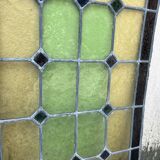 Pair of stained glass windows with geometric patterns late nineteenth century