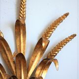 Applies "wheat sheaf" gold metal