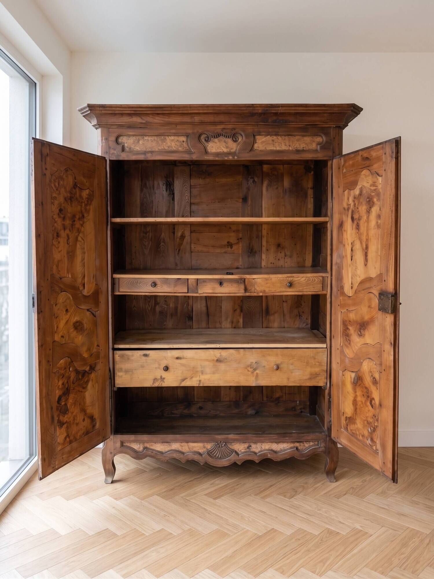 Antique Bressan wardrobe in carved wood