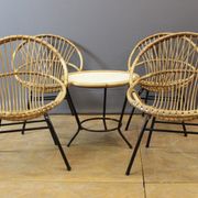Living room in rattan and black lacquered iron by Rohe Noordwole circa 1950