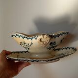Old gravy boat on frame in terre de fer earthenware by gien, “chardons” model in blue-green