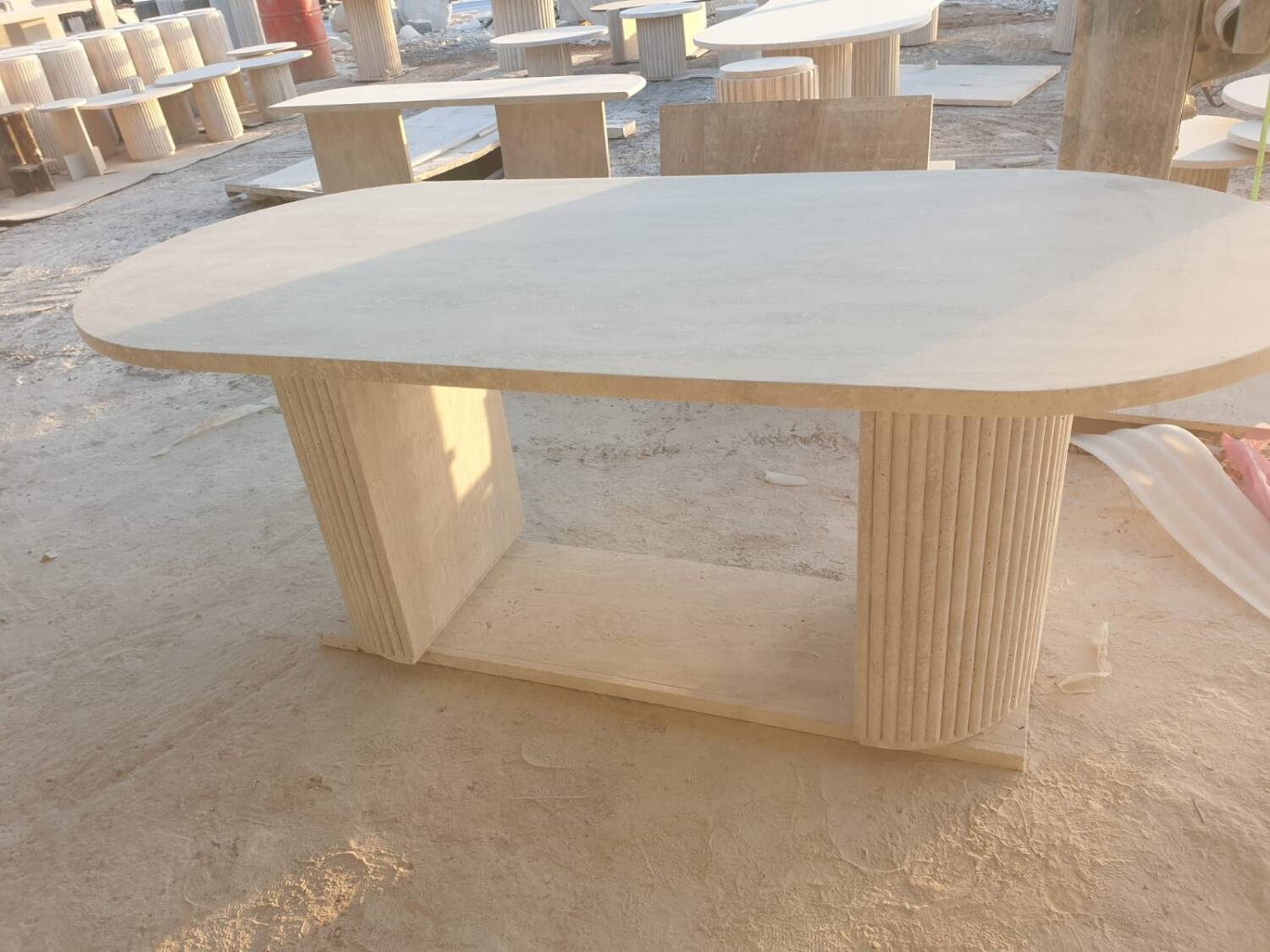 Dining table in travertine
