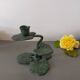 Ivy leaf design candle holder in green patinated metal